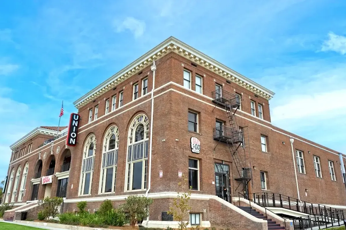 Exterior of The Union on Garey in downtown Pomona, the restored brick building that houses Gud2Go.